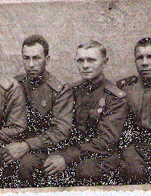 Голубев Иван Федотович (второй слева)