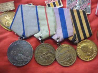 в 1945-м г. медаль "За победу над Германией в Великой Отечественной Войне 1941-1945гг".  в 1946-м г. медаль "За победу над Японией".