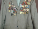Имеет : медаль "За победу над Германией", медаль "За победу над Японией", медаль " За боевые заслуги",  два ордена Отечественной Войны 2 степени