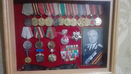 орден "Отечественной войны" 2ст., медаль "За военные заслуги", ряд медалей