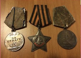 Орден Славы III степени, две медали за отвагу
