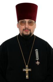Николай