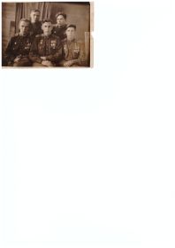 Стоят Александр Чернов и Иван Окружной. Сидят Денисенко В., Лопаткин Н., Грищенко П.