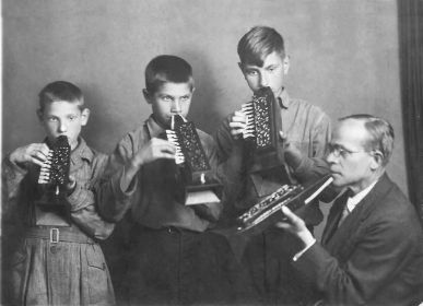 Алексей Алексеевич - средний брат в семье, братья играли на духовых инструментах