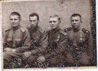 Голубев Иван Федотович (второй слева)