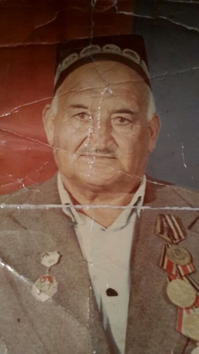 Комолов Зухриддин